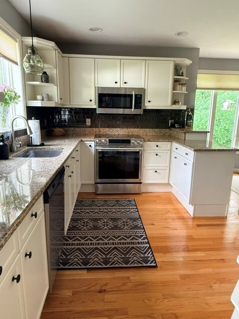 Hollis NH kitchen before remodel with dated oak cabinets